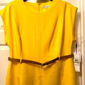 Calvin Klein dress size 14 brand new. It is a Canary yellow scuba dress.